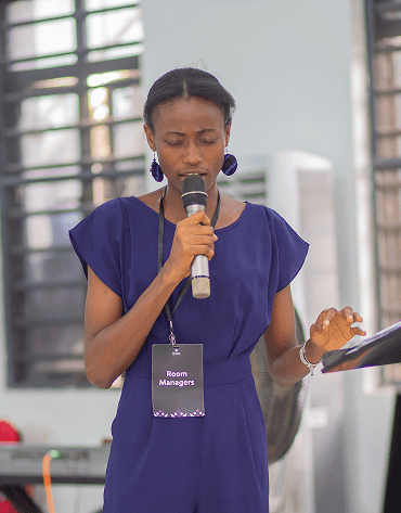 Volunteer speaking at event